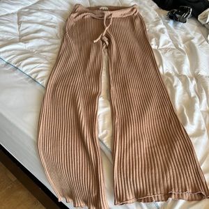 Tannish/pink flare textured leggings. Comfortable.